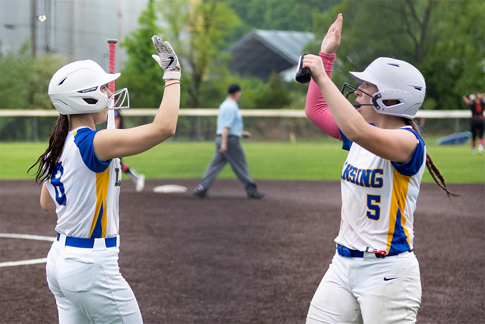 Lansing softball three-peats IAC division title